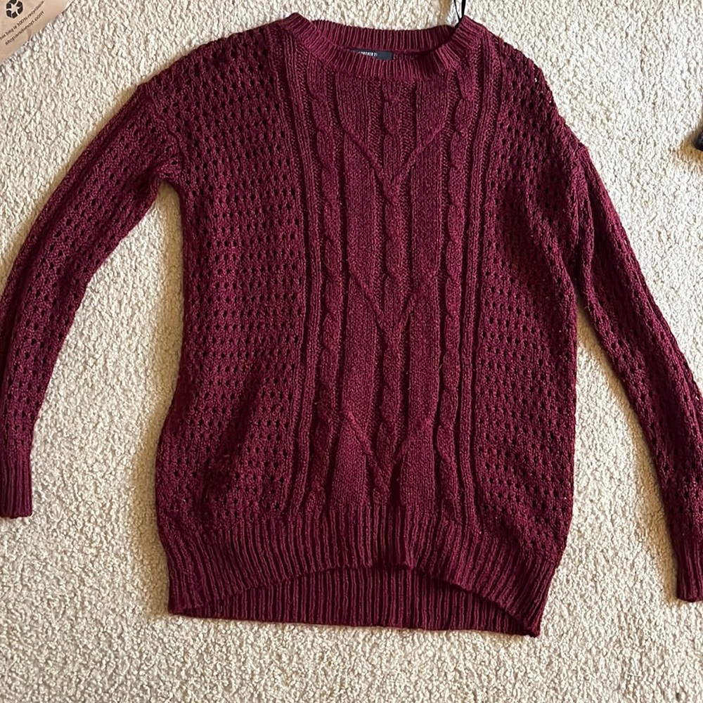 Sweater that I wore only a few times. Is true to size.